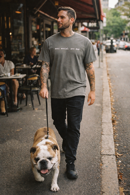 Black anti-social pro dog T-shirt by Snorties featuring a graphic design of a rebellious dog silhouette.