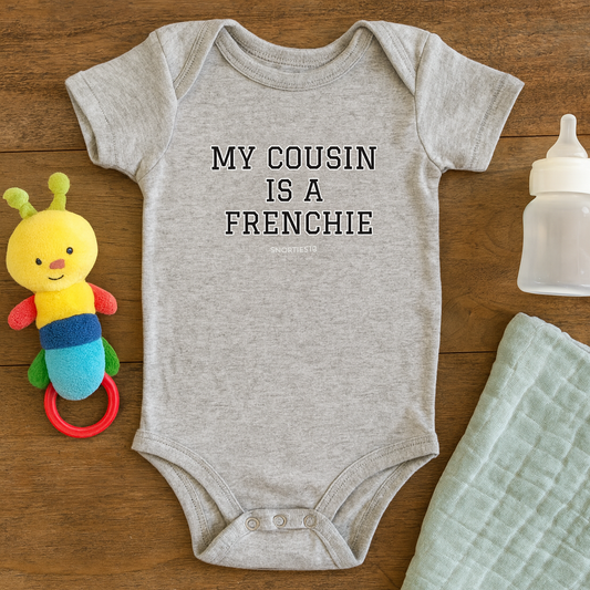 Snorties My Cousin Babies one-piece pajamas featuring a colorful, cozy design for infants.