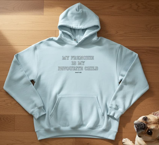 Pink hoodie with a French Bulldog graphic and text "My Frenchie is my favourite child" from Snorties, casual and cozy apparel.