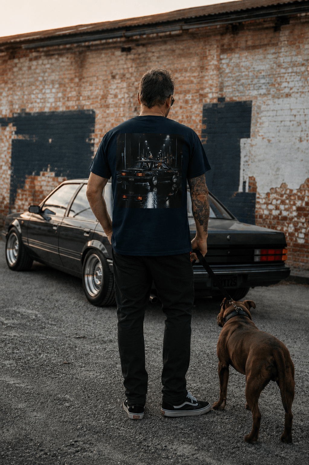 Snorties VK & Staffy T-shirt featuring a stylish graphic design worn in a casual lifestyle setting.