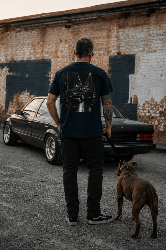 Snorties VK & Staffy T-shirt featuring a stylish graphic design worn in a casual lifestyle setting.